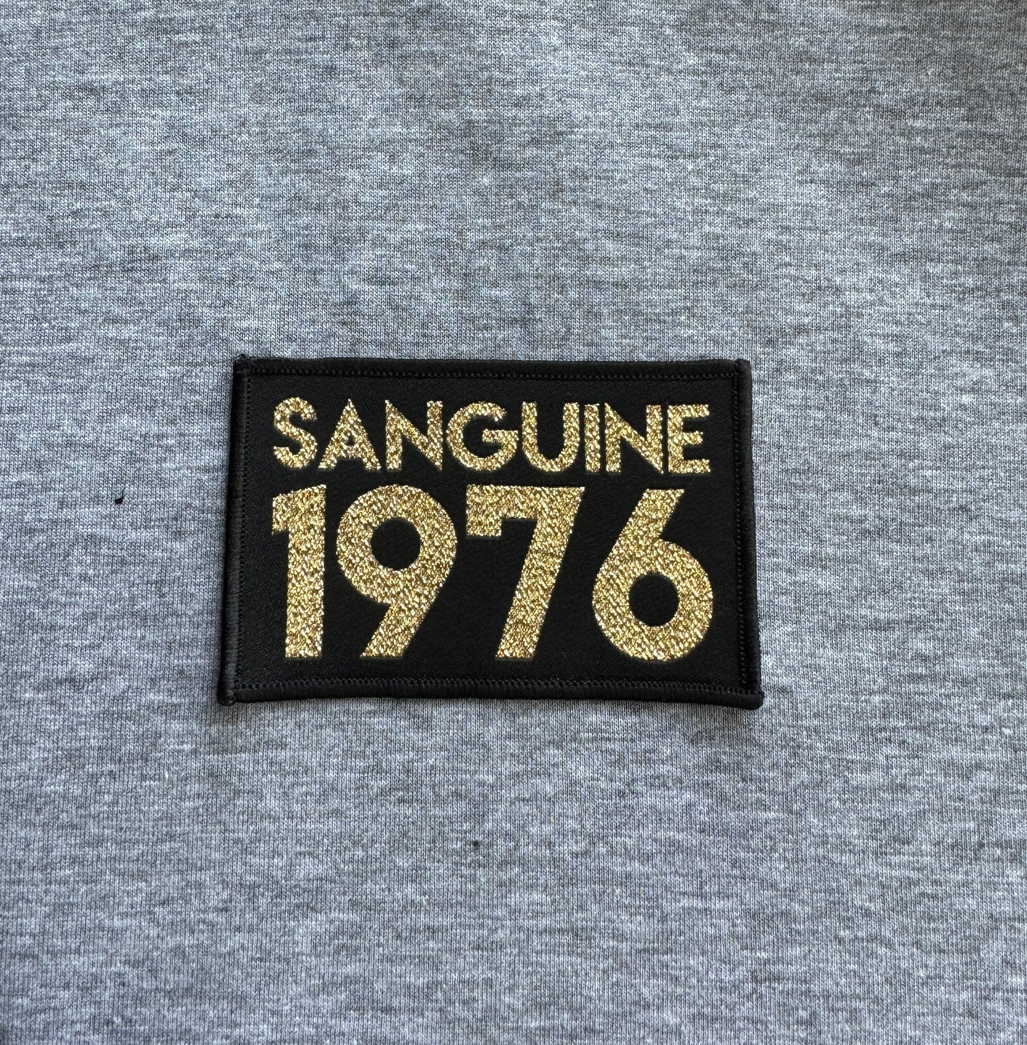 Custom made Sanguine 1976 T-shirt with Black & Gold patch to chest